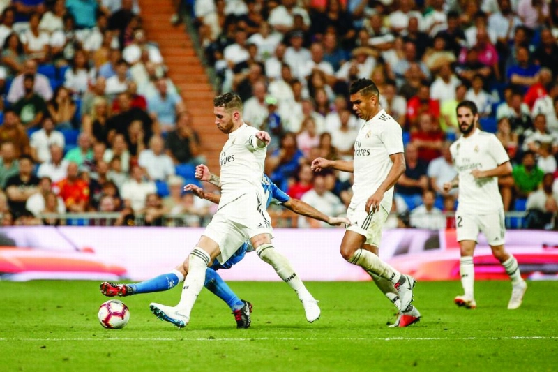 ريال مدريد وإسبانيول في الجولة السابقة (د ب أ)