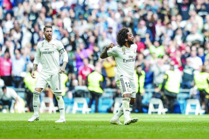 20 October 2018, Spain, Madrid: Real Madrid's Marcelo celebrates scoring his side's first goal during the Spanish Primera Division soccer match between Real Madrid and Levante UD at the Santiago Bernabeu stadium. Photo: Enrique de la Fuente/gtres/dpa