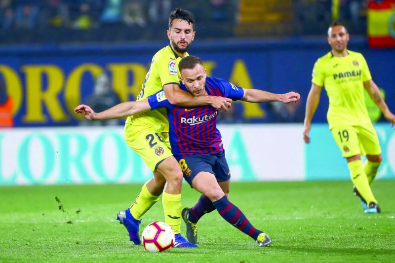 برشلونة وفياريال أمس الأول (د ب أ)