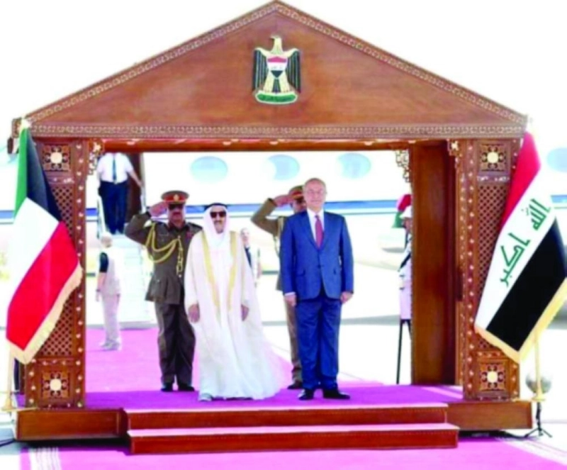 أمير الكويت مع الرئيس العراقي في بغداد (كونا)