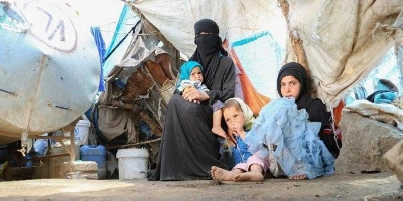 نساء وأطفال في الشارع بحجور (مكة)