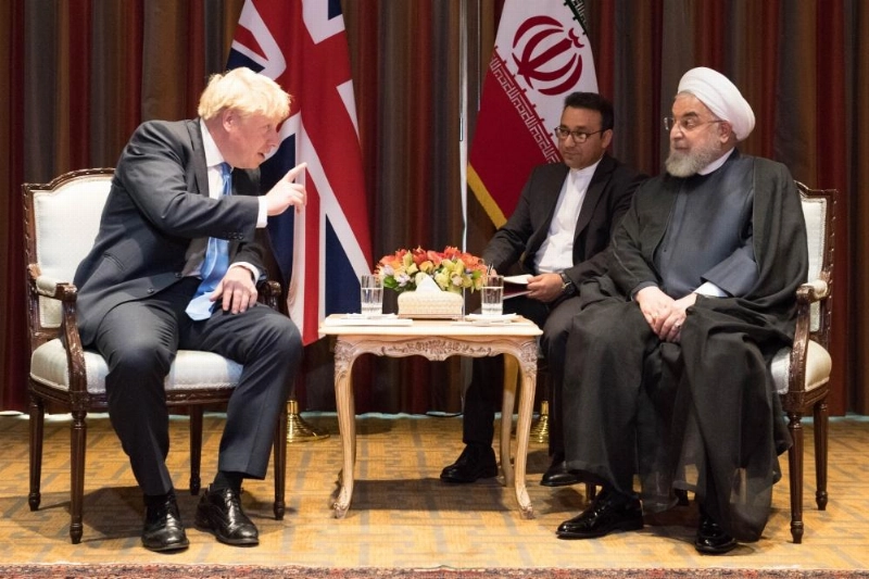 لقاء رئيس وزراء بريطانيا مع روحاني (د ب أ)
