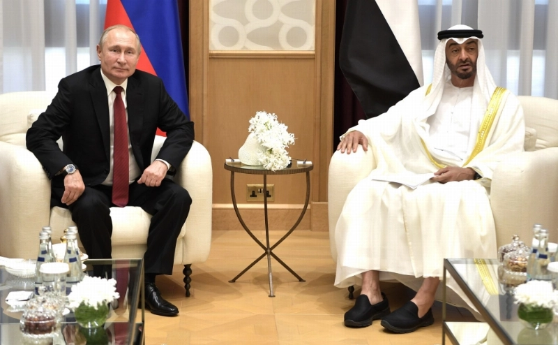 محمد بن زايد وبوتين في أبوظبي (د ب أ)