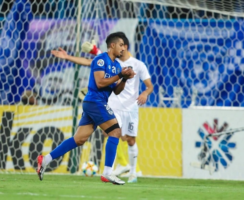 سالم الدوسري عقب هدفه في السد أمس (موقع دوري أبطال آسيا)