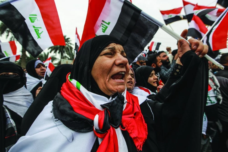 مسنة تشارك في المظاهرات