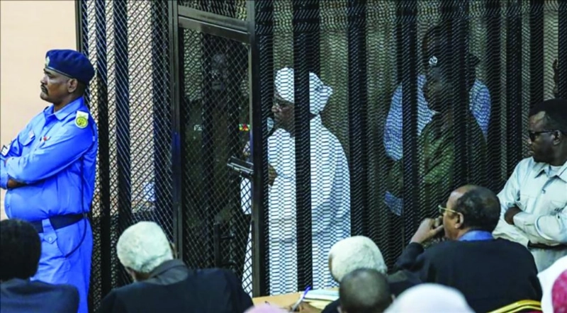 البشير خلف القضبان (مكة)