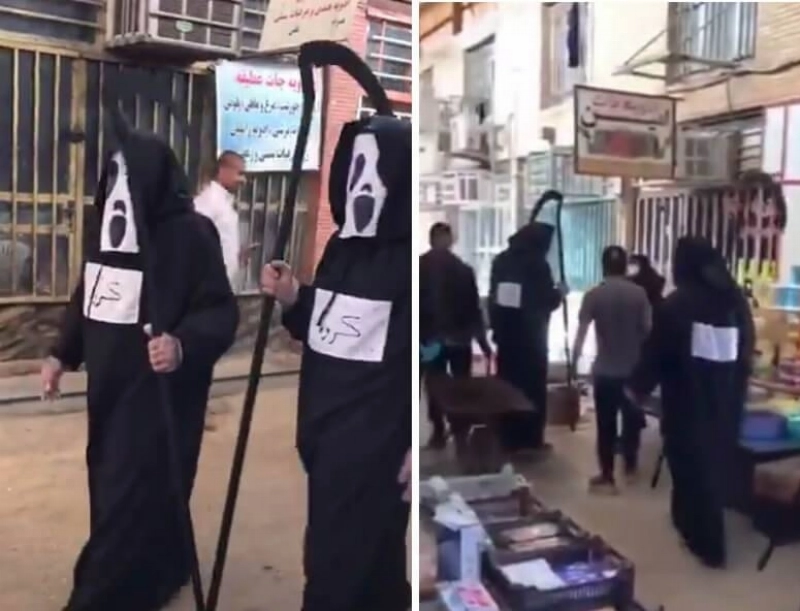 أشخاص بملابس سوداء يتجولون في الشوارع (مكة)