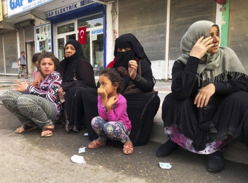 نساء وأطفال من اللاجئين السوريين في تركيا (مكة)