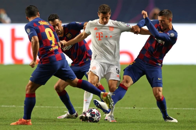 برشلونة وبايرن ميونخ أمس الأول (د ب أ)