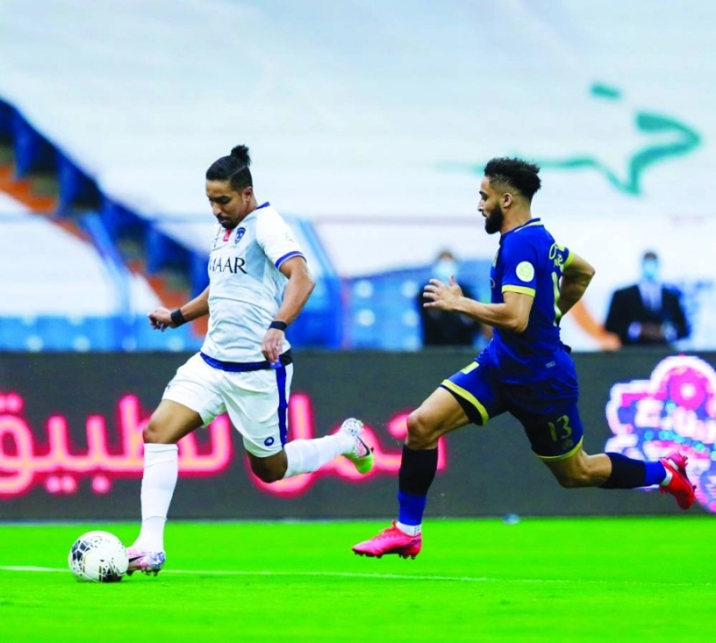 الهلال والنصر في مواجهتهما الأخيرة من النسخة الماضية للدوري (مكة)
