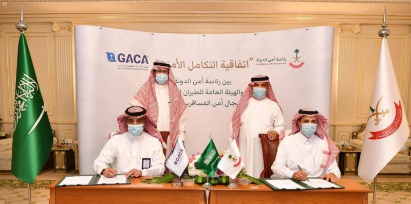 رئاسة أمن الدولة والهيئة العامة للطيران المدني تبرمان اتفاقية التكامل الأمني في مجال أمن المسافرين والشحن الجوي (واس)