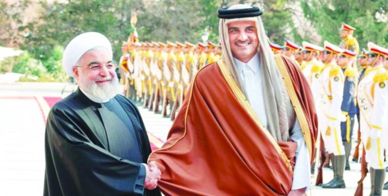 تميم بن حمد وحسن روحاني في لقاء سابق (مكة)