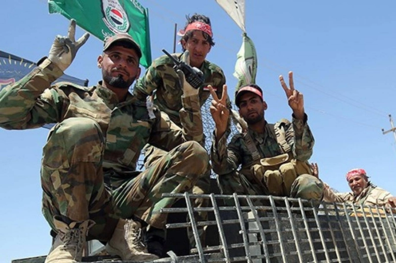عناصر من ميليشيات الحشد الشعبي (مكة)