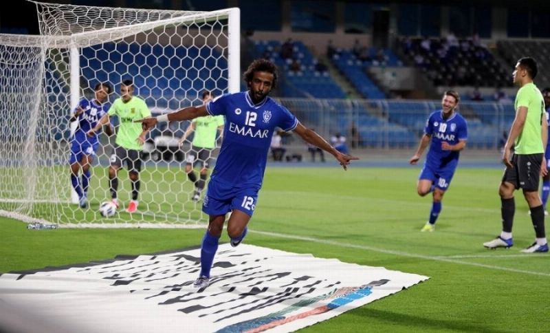 ياسر الشهراني محتفلا بهدفه في أجمك أمس (نواف الجبني)