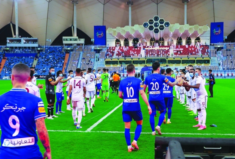 أسماء اللاعبين بالعربية في الممر الشرفي من الفيصلي للهلال (مكة)