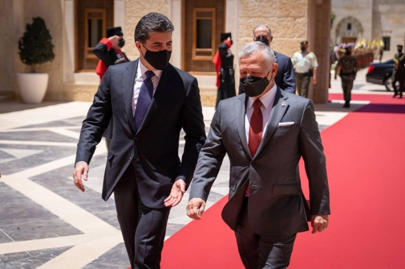 ملك الأردن لدى استقباله رئيس كردستان (د ب أ)