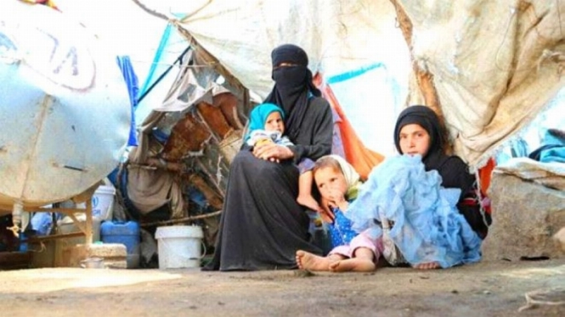 أسرة يمنية في أحد مخيمات اللاجئين (مكة)