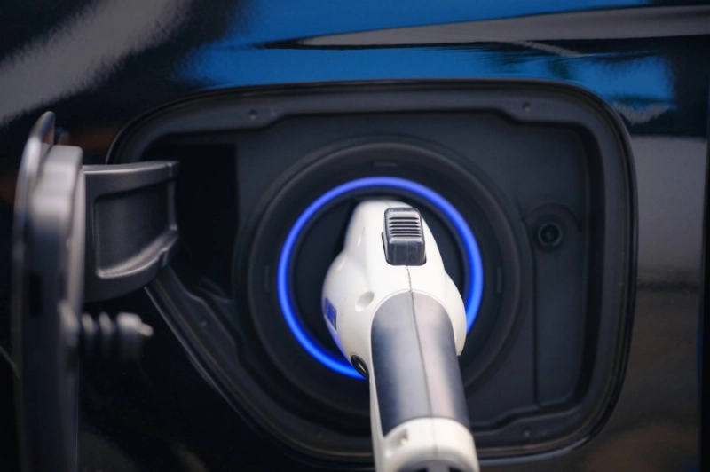Charging modern electric car battery on the street which are the