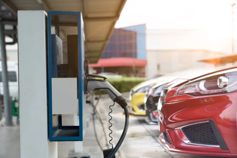 Electric car on electric car charging station. Power supply for
