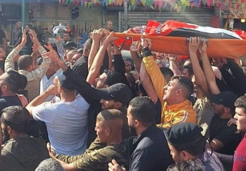 فلسطينيون يشيعون أحد الشهداء (مكة)