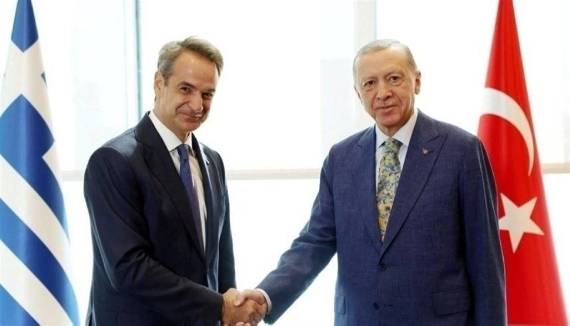 رجب طيب إردوغان وكيرياكوس ميتسوتاكيس (مكة)