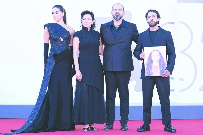 From left: Actress Saja Kilani, actress Clara Khoury, Israelian actor Amer Hlehel and actor Motaz Malhees, pose with a portrait of late Palestinian girl Hind Rajab, during the red carpet for the movie "The Voice of Hind Rajab" presented in competition at the 82nd International Venice Film Festival, at Venice Lido on September 3, 2025. (/ AFP) From left: Actress Saja Kilani, actress Clara Khoury, Israelian actor Amer Hlehel and actor Motaz Malhees, pose with a portrait of late Palestinian girl Hind Rajab, during the red carpet for the movie "The Voice of Hind Rajab" presented in competition at the 82nd International Venice Film Festival, at Venice Lido on September 3, 2025. (/ AFP)