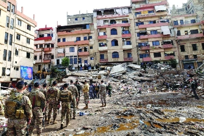 Lebanese soldiers secure the site on February 9, 2026, where an old residential building collapsed in the Bab al-Tabbaneh neighborhood of Tripoli a day earlier. The death toll in a building collapse in the northern Lebanese city of Tripoli rose to 14 after search and rescue operations ended, the civil defence chief said on February 9. (AFP) Lebanese soldiers secure the site on February 9, 2026, where an old residential building collapsed in the Bab al-Tabbaneh neighborhood of Tripoli a day earlier. The death toll in a building collapse in the northern Lebanese city of Tripoli rose to 14 after search and rescue operations ended, the civil defence chief said on February 9. (AFP)
