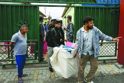 Polling officials carry ballot boxes and other materials at Damak in Jhapa district Monday ahead of parliamentary elections in Nepal. Polling officials carry ballot boxes and other materials at Damak in Jhapa district Monday ahead of parliamentary elections in Nepal.