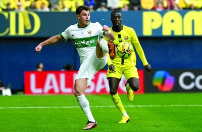 Elche's Spanish forward #11 German Valera fights for the ball with Villarreal's Ivorian forward #19 Nicolas Pepe during the Spanish league football match between Villarreal CF and Elche CF at La Ceramica Stadium in Vila-real on March 8, 2026. (AFP) Elche's Spanish forward #11 German Valera fights for the ball with Villarreal's Ivorian forward #19 Nicolas Pepe during the Spanish league football match between Villarreal CF and Elche CF at La Ceramica Stadium in Vila-real on March 8, 2026. (AFP)