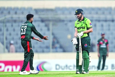 Pakistan’s Salman Agha (right) speaks with Bangladesh’s captain Mehidy Hasan Miraz after his dismissal during the second ODI at Sher-e-Bangla National Stadium in Mirpur on Friday. (AFP)
Pakistan’s Salman Agha (right) speaks with Bangladesh’s captain Mehidy Hasan Miraz after his dismissal during the second ODI at Sher-e-Bangla National Stadium in Mirpur on Friday. (AFP)