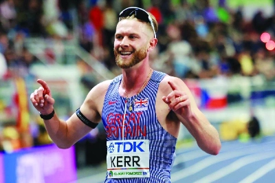 Britain's Josh Kerr celebrates winning the men's 3000m final during the World Athletics Indoor Championships Kujawy Pomorze 2026 in Torun, Poland on March 21, 2026. (AFP) Britain's Josh Kerr celebrates winning the men's 3000m final during the World Athletics Indoor Championships Kujawy Pomorze 2026 in Torun, Poland on March 21, 2026. (AFP)