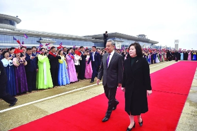 Chinese Foreign Minister Wang Yi (left) is welcomed by North Korean Foreign Minister Choe Son-hui upon arriving on a two-day visit at Pyongyang International Airport Thursday. (AFP) Chinese Foreign Minister Wang Yi (left) is welcomed by North Korean Foreign Minister Choe Son-hui upon arriving on a two-day visit at Pyongyang International Airport Thursday. (AFP)