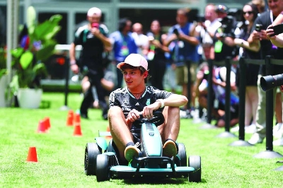 Mercedes driver Andrea Kimi Antonelli drives a mini kart in the paddock Thursday, ahead of the Formula 1 Grand Prix of Miami. (AFP) Mercedes driver Andrea Kimi Antonelli drives a mini kart in the paddock Thursday, ahead of the Formula 1 Grand Prix of Miami. (AFP)