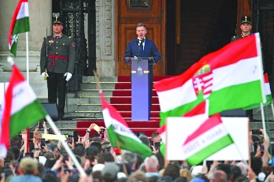 Hungary's incoming Prime Minister Peter Magyar delivers a speech outside the Hungarian parliament after his swearing-in ceremony in Budapest on May 9, 2026. Lawmakers in Hungary on May 9, 2026 swore in pro-European conservative Peter Magyar as the country's new prime minister, after elections last month that ended Viktor Orban's 16 years in power. The parliament formally elected Magyar with 140 votes for, 54 against, and one abstention in the inaugural session of the new chamber resulting from the April polls. (AFP) Hungary's incoming Prime Minister Peter Magyar delivers a speech outside the Hungarian parliament after his swearing-in ceremony in Budapest on May 9, 2026. Lawmakers in Hungary on May 9, 2026 swore in pro-European conservative Peter Magyar as the country's new prime minister, after elections last month that ended Viktor Orban's 16 years in power. The parliament formally elected Magyar with 140 votes for, 54 against, and one abstention in the inaugural session of the new chamber resulting from the April polls. (AFP)