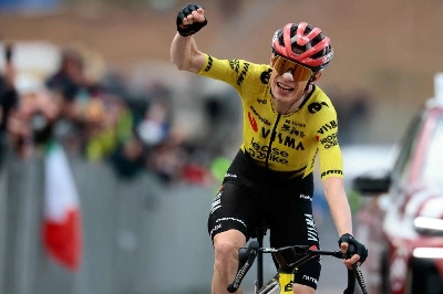 Team Visma Lease a Bike Danish rider Jonas Vingegaard celebrates as he crosses the finish line to win the 7th stage of the Giro d'Italia 2026 - Tour of Italy cycling race between Formia and Blockhaus, Italy, on May 15, 2026. (AFP) Team Visma Lease a Bike Danish rider Jonas Vingegaard celebrates as he crosses the finish line to win the 7th stage of the Giro d'Italia 2026 - Tour of Italy cycling race between Formia and Blockhaus, Italy, on May 15, 2026. (AFP)