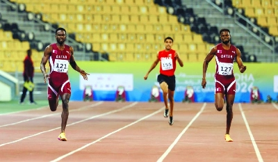 Qatar’s Ammar Ibrahim (left) producing a stunning run to win the men’s 400m title in ahead of compatriot Ashraf Osman at the Qatar Sports Club.
Qatar’s Ammar Ibrahim (left) producing a stunning run to win the men’s 400m title in ahead of compatriot Ashraf Osman at the Qatar Sports Club.