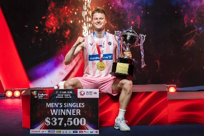 Denmark's Anders Antonsen celebrates with the trophy after his victory against Thailand's Kunlavut Vitidsarn in their Thailand Open final in Bangkok on May 17, 2026. (AFP) Denmark's Anders Antonsen celebrates with the trophy after his victory against Thailand's Kunlavut Vitidsarn in their Thailand Open final in Bangkok on May 17, 2026. (AFP)