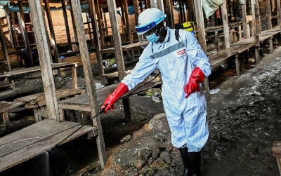 A sanitation worker from the Bunia city government sprays chlorine at the central market to limit the risk of the spread of the Ebola virus, as authorities intensify efforts to contain a new Ebola outbreak involving the Bundibugyo strain, in Bunia, Ituri province, Democratic Republic of Congo, May 23, 2026. REUTERS/Stringer TPX IMAGES OF THE DAY A sanitation worker from the Bunia city government sprays chlorine at the central market to limit the risk of the spread of the Ebola virus, as authorities intensify efforts to contain a new Ebola outbreak involving the Bundibugyo strain, in Bunia, Ituri province, Democratic Republic of Congo, May 23, 2026. REUTERS/Stringer TPX IMAGES OF THE DAY
