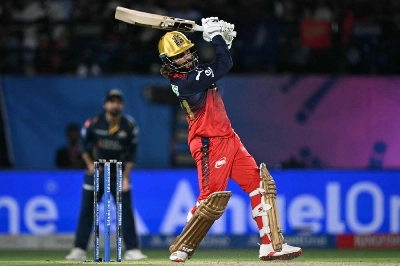 Royal Challengers Bengaluru's captain Rajat Patidar plays a shot during the 2026 Indian Premier League T20 match against Gujarat Titans at the Himachal Pradesh Cricket Association Stadium in Dharamshala on May 26, 2026. (AFP) Royal Challengers Bengaluru's captain Rajat Patidar plays a shot during the 2026 Indian Premier League T20 match against Gujarat Titans at the Himachal Pradesh Cricket Association Stadium in Dharamshala on May 26, 2026. (AFP)