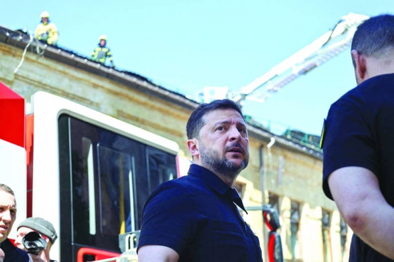 Ukraine's President Volodymyr Zelensky (C) talks to his Minister of Internal Affairs Igor Klymenko (R) as he arrives at the National Chernobyl Museum, heavily damaged by an overnight Russian airstrike, in Kyiv on May 24, 2026, amid the Russian invasion of Ukraine. AFP journalists reported intense shelling on the Ukrainian capital overnight from May 23 to 24, 2026 which left at least four people dead in Kyiv and its surrounding area, just days after a deadly Ukrainian attack on a high school in a Russian-occupied region - an incident for which Russian President Vladimir Putin had vowed a military response. (Photo by Serhii Okunev / AFP) Ukraine's President Volodymyr Zelensky (C) talks to his Minister of Internal Affairs Igor Klymenko (R) as he arrives at the National Chernobyl Museum, heavily damaged by an overnight Russian airstrike, in Kyiv on May 24, 2026, amid the Russian invasion of Ukraine. AFP journalists reported intense shelling on the Ukrainian capital overnight from May 23 to 24, 2026 which left at least four people dead in Kyiv and its surrounding area, just days after a deadly Ukrainian attack on a high school in a Russian-occupied region - an incident for which Russian President Vladimir Putin had vowed a military response. (Photo by Serhii Okunev / AFP)