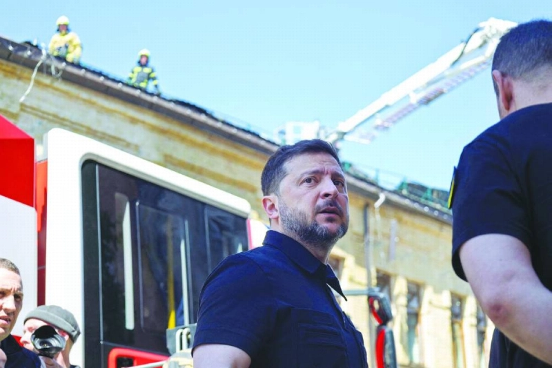 Ukraine's President Volodymyr Zelensky (C) talks to his Minister of Internal Affairs Igor Klymenko (R) as he arrives at the National Chernobyl Museum, heavily damaged by an overnight Russian airstrike, in Kyiv on May 24, 2026, amid the Russian invasion of Ukraine. AFP journalists reported intense shelling on the Ukrainian capital overnight from May 23 to 24, 2026 which left at least four people dead in Kyiv and its surrounding area, just days after a deadly Ukrainian attack on a high school in a Russian-occupied region — an incident for which Russian President Vladimir Putin had vowed a military response. (Photo by Serhii Okunev / AFP) Ukraine's President Volodymyr Zelensky (C) talks to his Minister of Internal Affairs Igor Klymenko (R) as he arrives at the National Chernobyl Museum, heavily damaged by an overnight Russian airstrike, in Kyiv on May 24, 2026, amid the Russian invasion of Ukraine. AFP journalists reported intense shelling on the Ukrainian capital overnight from May 23 to 24, 2026 which left at least four people dead in Kyiv and its surrounding area, just days after a deadly Ukrainian attack on a high school in a Russian-occupied region — an incident for which Russian President Vladimir Putin had vowed a military response. (Photo by Serhii Okunev / AFP)