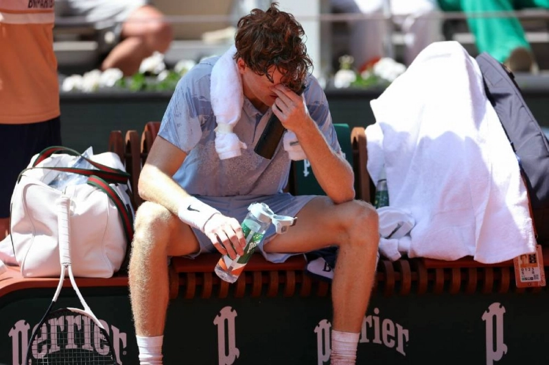 Italy's World number one Jannik Sinner, the red-hot favourite at Roland Garros this year, suffered a dramatic five-set defeat by Argentina's Juan Manuel Cerundolo after a sudden collapse on another sweltering day in Paris. (AFP)
Italy's World number one Jannik Sinner, the red-hot favourite at Roland Garros this year, suffered a dramatic five-set defeat by Argentina's Juan Manuel Cerundolo after a sudden collapse on another sweltering day in Paris. (AFP)