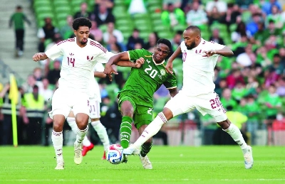 Ireland's midfielder Chiedozie Ogbene is put under pressure by Qatar's defender Homam Al Amin (left) and midfielder Ahmed Fathy during the international friendly match at the Aviva Stadium in Dublin, Ireland. (AFP) Ireland's midfielder Chiedozie Ogbene is put under pressure by Qatar's defender Homam Al Amin (left) and midfielder Ahmed Fathy during the international friendly match at the Aviva Stadium in Dublin, Ireland. (AFP)