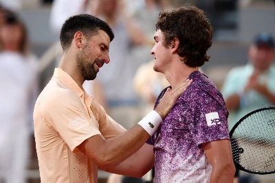 Brazil's Joao Fonseca celebrates winning his third-round match against Serbia's Novak Djokovic at the French Open in Paris on Friday. (Reuters) Brazil's Joao Fonseca celebrates winning his third-round match against Serbia's Novak Djokovic at the French Open in Paris on Friday. (Reuters)