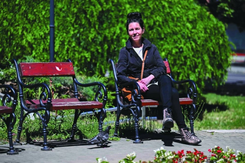 Photo taken on May 29, 2026 shows Aranka Szavuly, the former vice-chairman of the trade union committee of the state television station MTVA in a public garden of Budapest, Hungary. Fired in 2011 from Hungarian state media for protesting government meddling in news programmes, Aranka Szavuly is eager to return as a journalist, but says significant reforms are needed after 16 years of nationalist Viktor Orban's rule. (Photo by Attila KISBENEDEK / AFP) Photo taken on May 29, 2026 shows Aranka Szavuly, the former vice-chairman of the trade union committee of the state television station MTVA in a public garden of Budapest, Hungary. Fired in 2011 from Hungarian state media for protesting government meddling in news programmes, Aranka Szavuly is eager to return as a journalist, but says significant reforms are needed after 16 years of nationalist Viktor Orban's rule. (Photo by Attila KISBENEDEK / AFP)