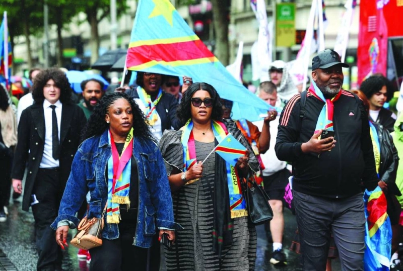 Protesters walk down O’Connell Street in central Dublin at the head of a protest to demand justice following the death of Democratic Republic of the Congo citizen Yves Sakila, after he was violently restrained by shop security guards who suspected him of shoplifting, on May 30, 2026. (Photo by Damien Eagers / AFP) Protesters walk down O’Connell Street in central Dublin at the head of a protest to demand justice following the death of Democratic Republic of the Congo citizen Yves Sakila, after he was violently restrained by shop security guards who suspected him of shoplifting, on May 30, 2026. (Photo by Damien Eagers / AFP)