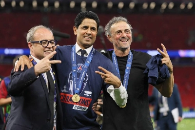 PSG's President Nasser al-Khelaifi (centre) and Spanish head coach Luis Enrique (right) pose with the club's Portuguese Football Advisor Luis Campos winning the UEFA Champions League final against Arsenal at the Puskas Arena in Budapest on May 30, 2026. (AFP) PSG's President Nasser al-Khelaifi (centre) and Spanish head coach Luis Enrique (right) pose with the club's Portuguese Football Advisor Luis Campos winning the UEFA Champions League final against Arsenal at the Puskas Arena in Budapest on May 30, 2026. (AFP)