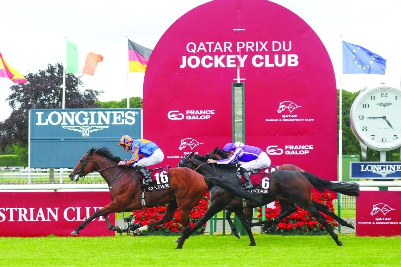 Ryan Moore rides Constitution River to victory in the QREC-sponsored Qatar Prix du Jockey Club in France. Ryan Moore rides Constitution River to victory in the QREC-sponsored Qatar Prix du Jockey Club in France.