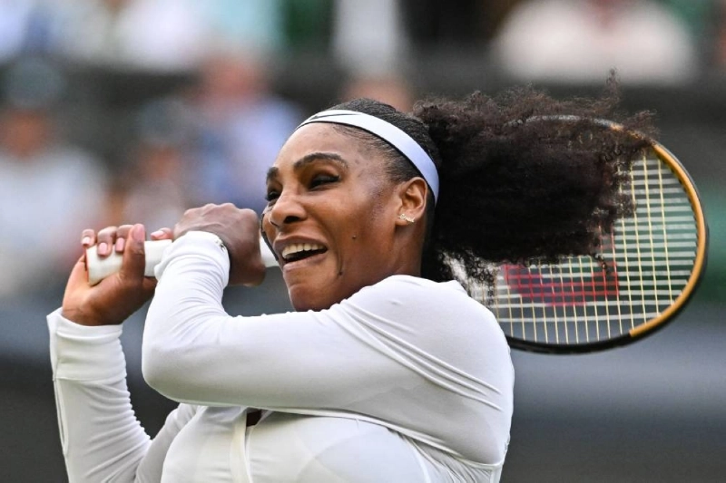US player Serena Williams returns the ball to France's Harmony Tan during their Wimbledon Championships match at The All England Tennis Club in Wimbledon, southwest London, on June 28, 2022. Serena Williams will make her return to competitive tennis in the women's doubles at Queen's this month, tournament organisers announced on June 1.(AFP) US player Serena Williams returns the ball to France's Harmony Tan during their Wimbledon Championships match at The All England Tennis Club in Wimbledon, southwest London, on June 28, 2022. Serena Williams will make her return to competitive tennis in the women's doubles at Queen's this month, tournament organisers announced on June 1.(AFP)