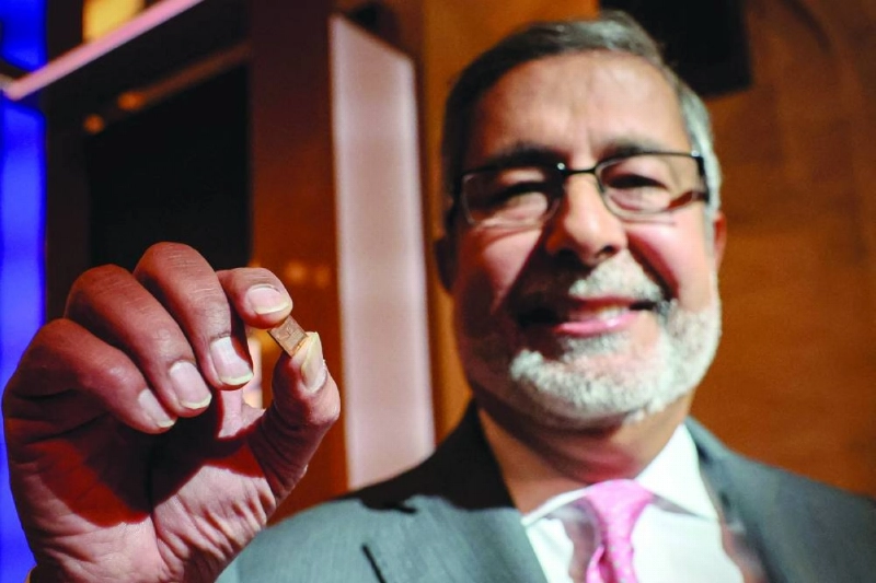 Sanjay Mehrotra, CEO of Micron Technology Inc, shows a chip on the floor at the New York Stock Exchange. (Reuters/File Photo)
Sanjay Mehrotra, CEO of Micron Technology Inc, shows a chip on the floor at the New York Stock Exchange. (Reuters/File Photo)